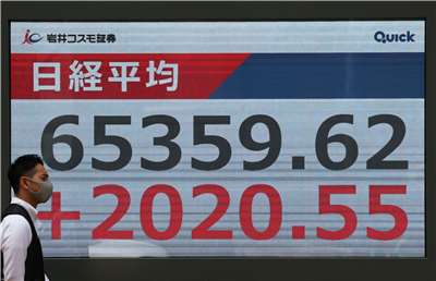 日本東京股市日經指數25日首度衝破6萬5000點。
