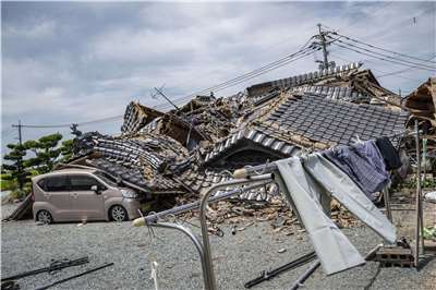 日本熊本縣本月28日下午發生強震，冰川町的房屋被震垮。