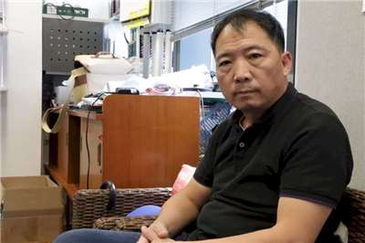上週抵達英國倫敦與妻兒重逢的香港民主黨前主席胡志偉，本週可能就會被遣返回香港。 (圖：中央社檔案照)