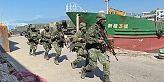 漢光42號演習進入第2天，6日上午台東富岡港集結逾百名全副武裝國軍，在交互掩護下登上客輪，以及各式建制武器與軍需物資裝載作業，隨後急赴綠島、蘭嶼。