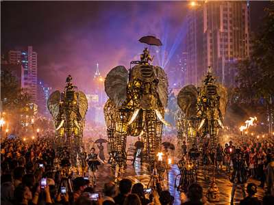 2026臺北藝術節將於9月5、6日晚間登場，法國奧波西托劇團帶來《大象來了……》三隻巨型機械大象夜遊士林，在光影與樂聲中展開一場奇幻街頭嘉年華。