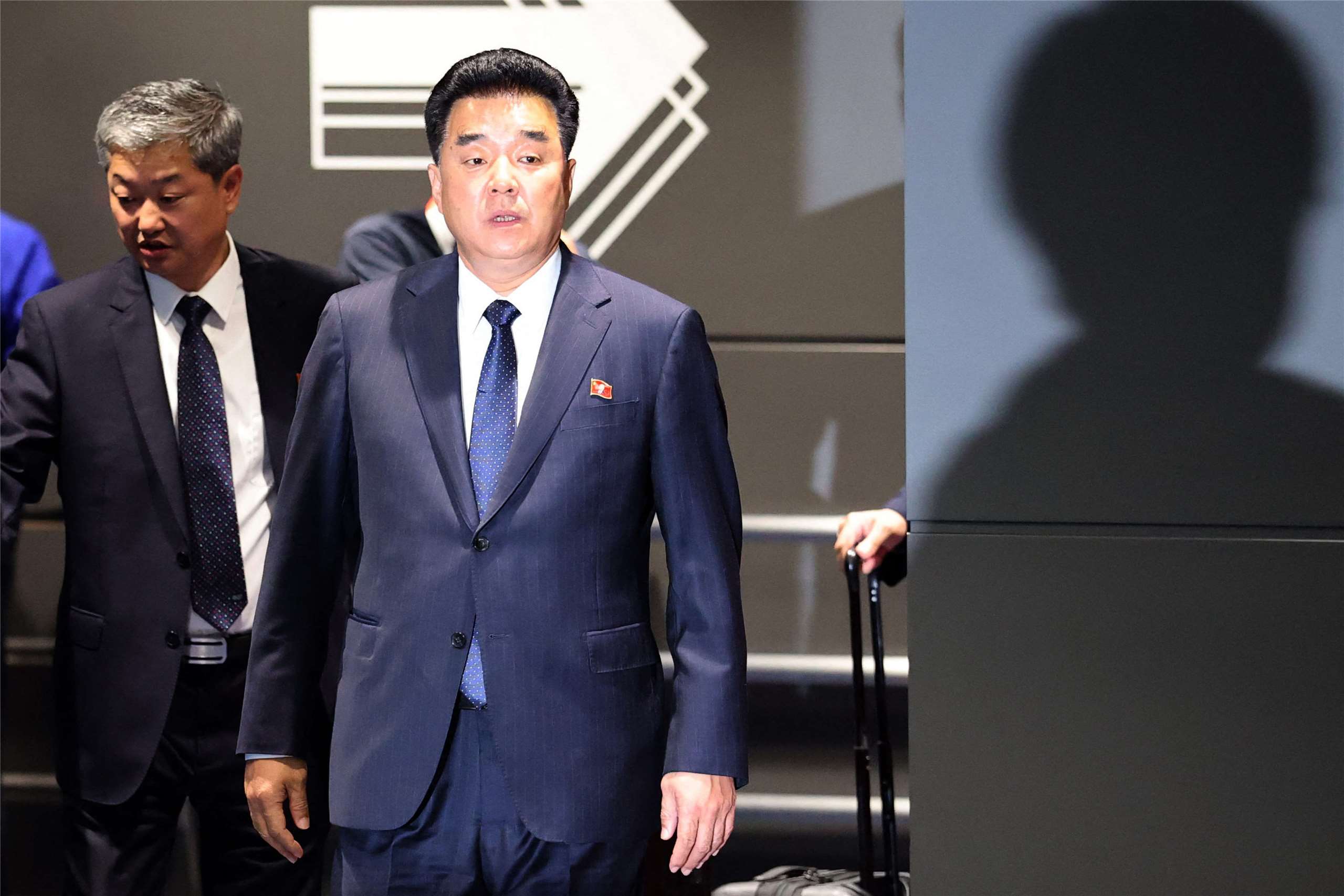 北韓體育相(相當於部長)金日國(KIM Il Guk)因為亞運而罕見訪問日本。(AFP)