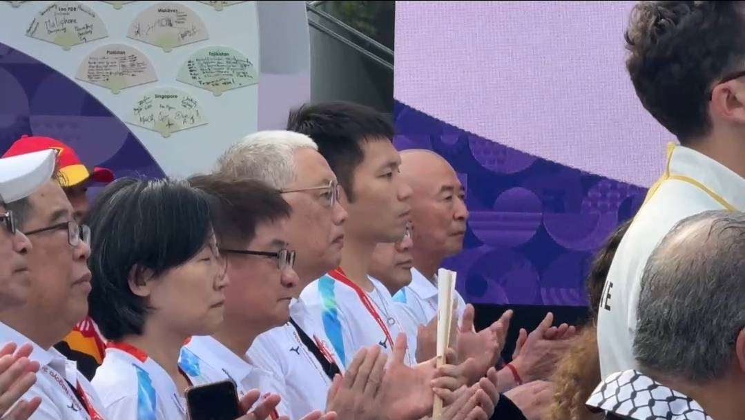 運動部長李洋(中)18日原訂出席名古屋亞運選手村開村儀式時，一度臨時被要求不得進場，後來順利進場。(中華奧會提供)