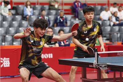 名古屋亞運26日進行桌球男雙8強賽，台灣組合馮翊新、郭冠宏最終以9比11、15比17、4比11敗給中國隊，台灣無緣連2屆男雙奪銅。(中華奧會提供)