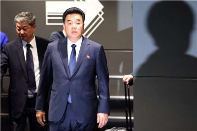 北韓體育相(相當於部長)金日國(KIM Il Guk)因為亞運而罕見訪問日本。(AFP)