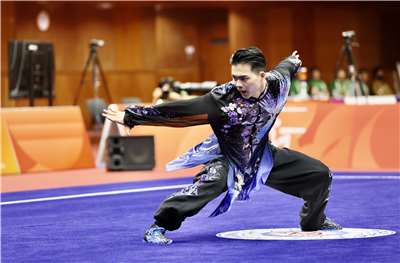 武術好手孫家閎21日在名古屋亞運男子太極拳太極劍全能項目摘下銀牌！其中太極拳項目拿下9.733分高分，奠定奪牌基礎。(中華奧會提供)