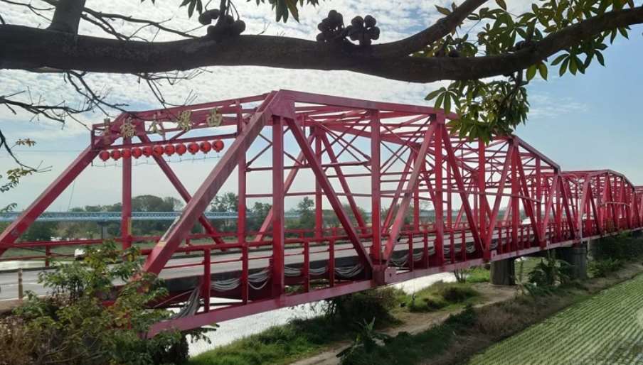 “สะพานซีหลัว” สะพานเหล็กสีแดงข้ามแม่น้ำจั๋วสุ่ย เชื่อมเมืองจางฮั่วและหยุนหลิน และเคยได้รับสมญา “สะพานอันดับหนึ่งของตะวันออกไกล” (ภาพ:udn)